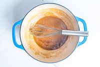 Winco Stainless Steel Piano Wire Whip in a pot