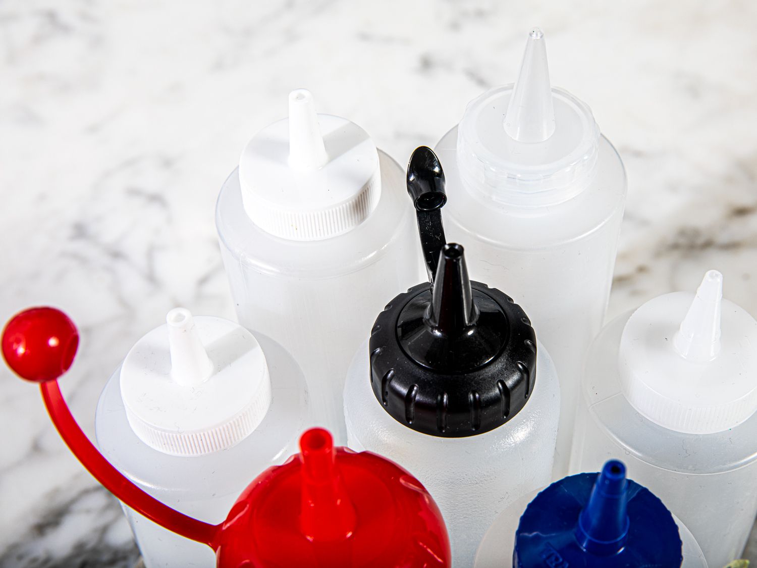 closeup of nozzles on squeeze bottles