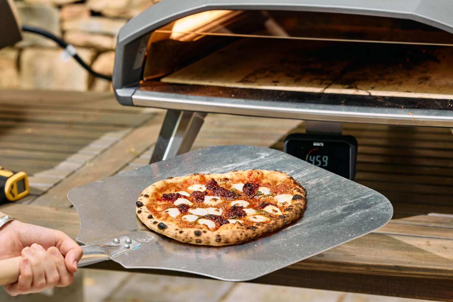 A pizza cooked in the Ooni Koda 2 Pro Gas-Powered Pizza Oven