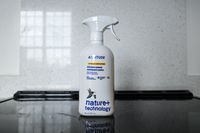 A bottle of Attitude brand kitchen cleaner placed on a kitchen counter