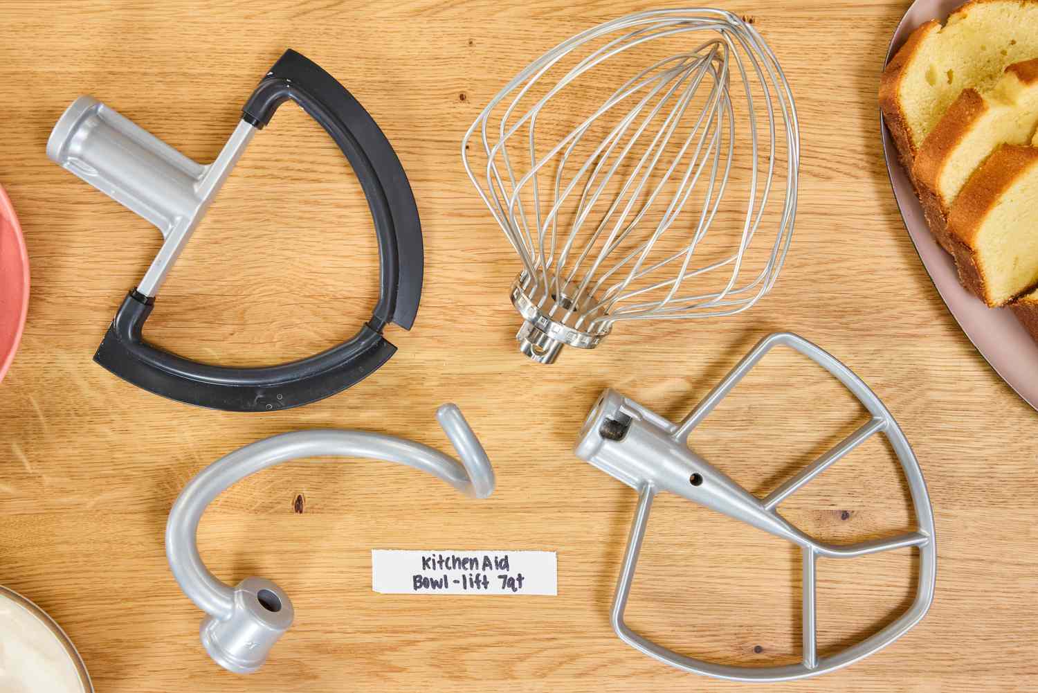 KitchenAid stand mixer attachments on table