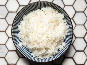 a top-down view of a bowl of white rice