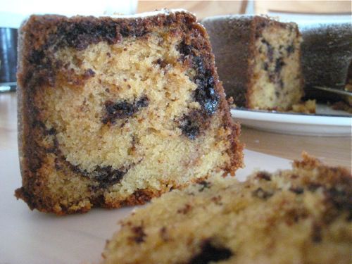 Close-up of a slice of the finished Philly fluff cake. The chocolate swirl is prominent, as is the browned outer layer.