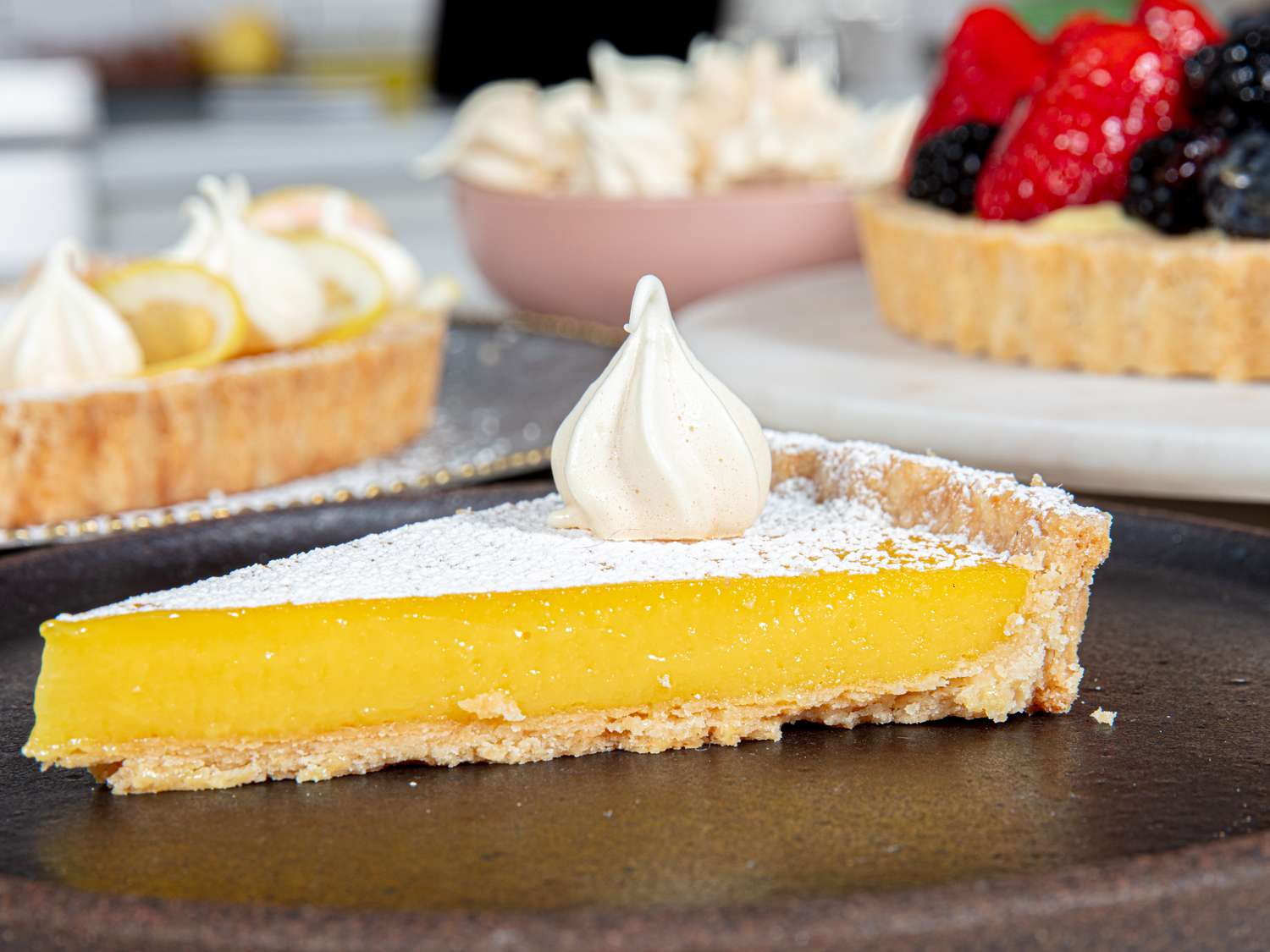 Side view of a slice of lemon tart 