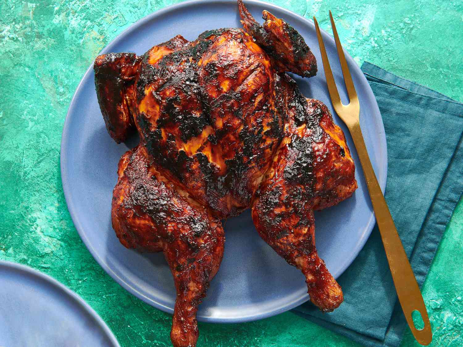 Barbecue chicken on a serving plate.