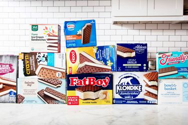 Boxes of ice cream sandwiches on a kitchen counter.