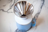 Yeti Rambler Pour-Over on top of a blue Yeti mug