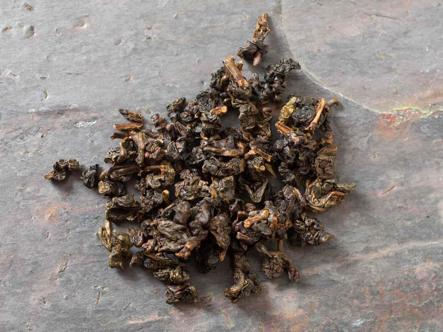 A small pile of loose dark oolong tea from Everlasting Tea. 