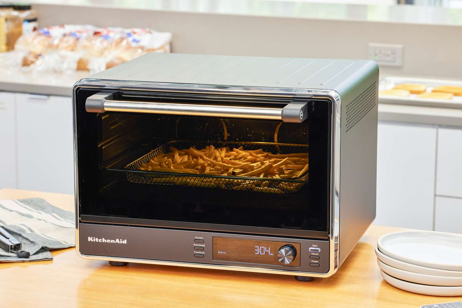 Fries cooking in the KitchenAid Dual Convection Countertop Oven with Air Fryer