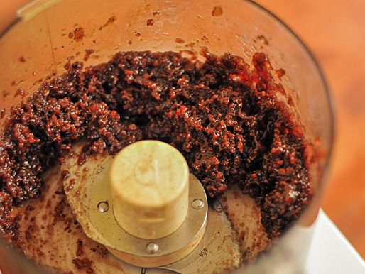 Bacon jam mixture in a food processor.