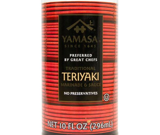 Closeup of bottle of teriyaki sauce with red and black stripes