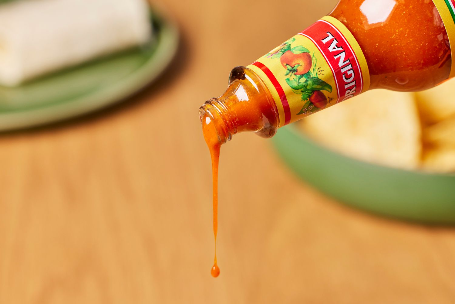 Cholula Original Hot Sauce being poured