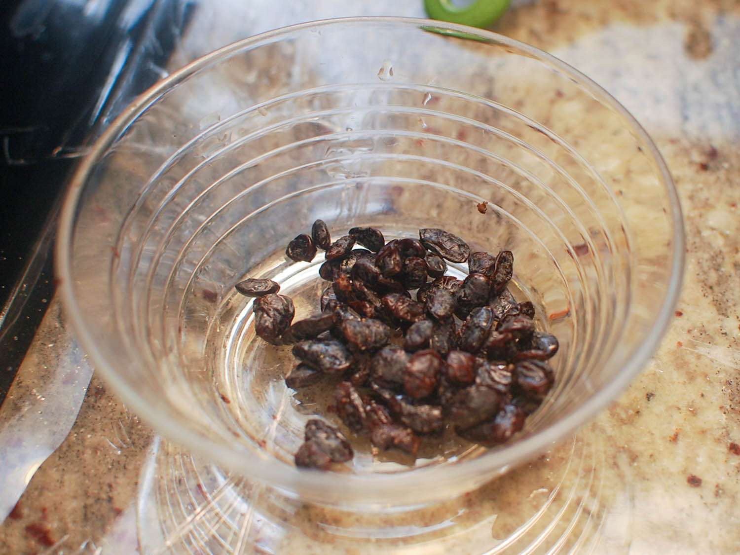 Rinsed and drained fermented black beans in a bowl, ready to add to the pan.