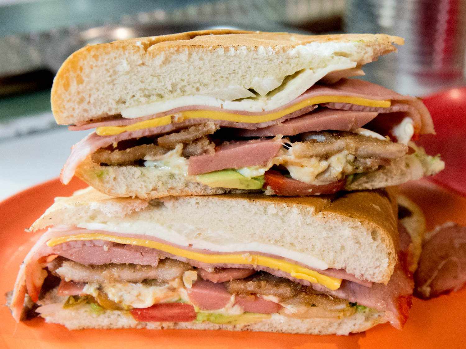 two halves of a torta cubana stacked on top of one another