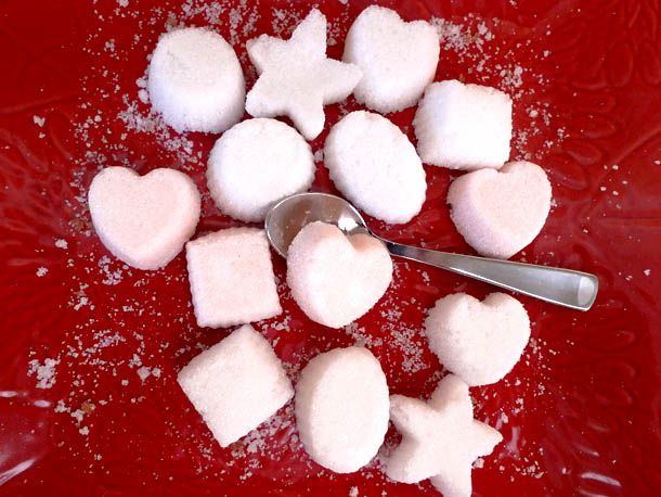 Molded sugar "cubes" in a medley of shapes: cubes, hearts, stars, etc.