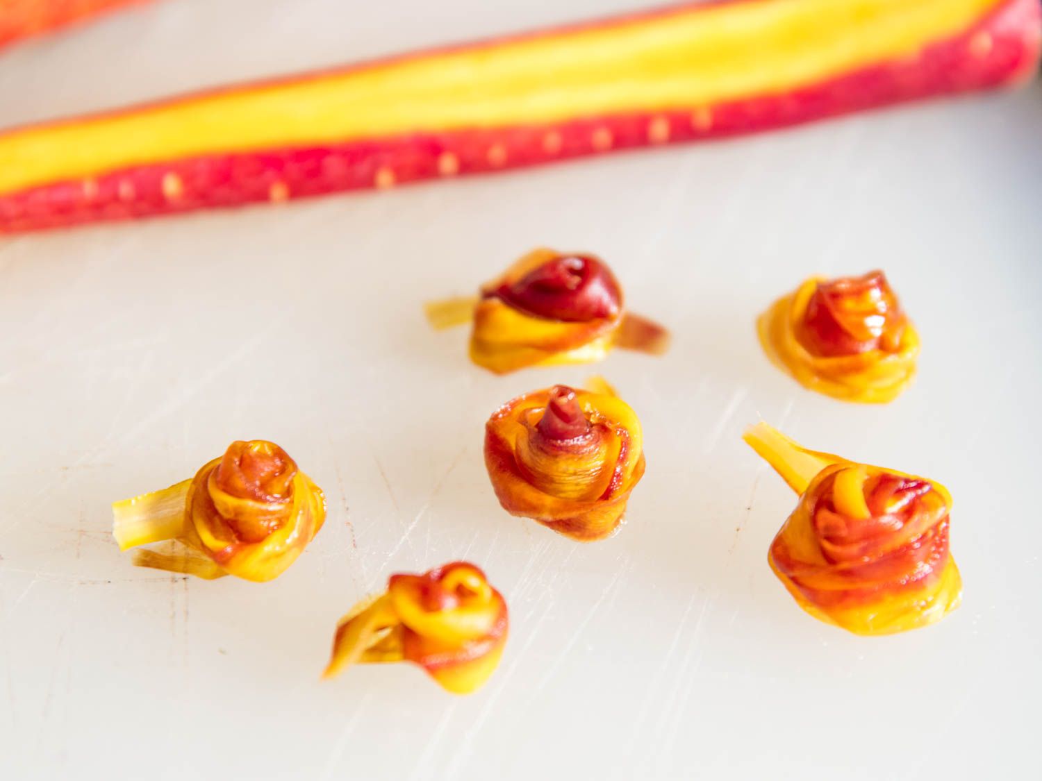 Carrot strips twisted into roses.