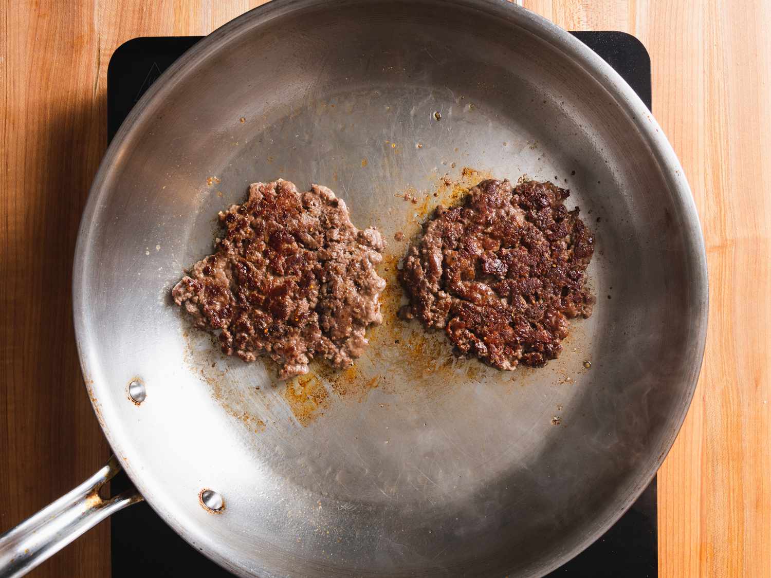 Burgers flipped, nicely browned