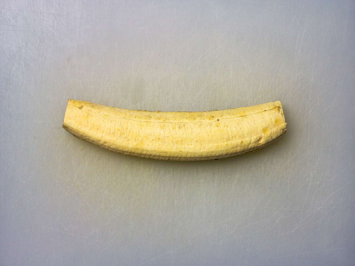 Overhead of a peeled plantain 