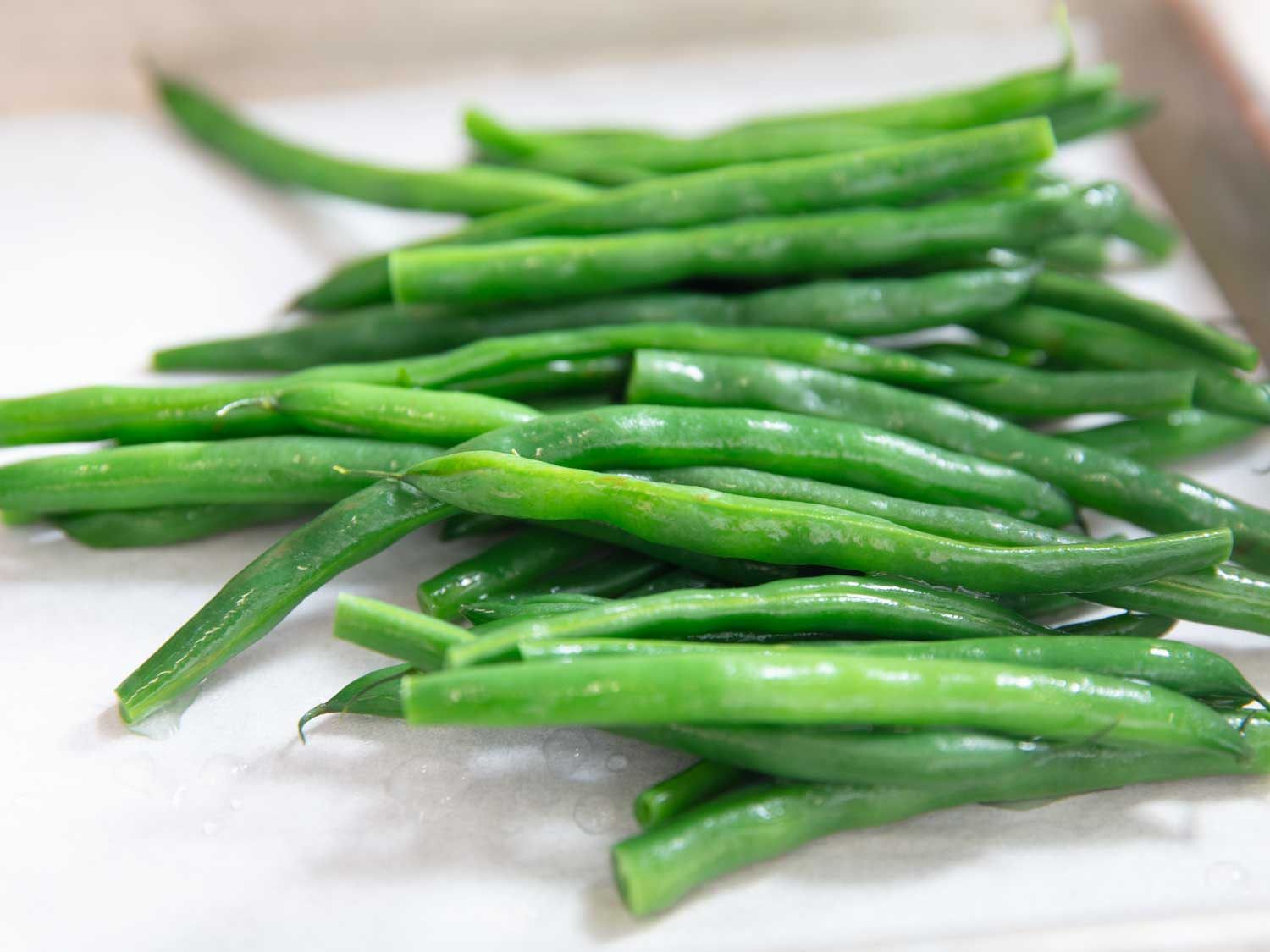 Closeup of blanched whole green beans.