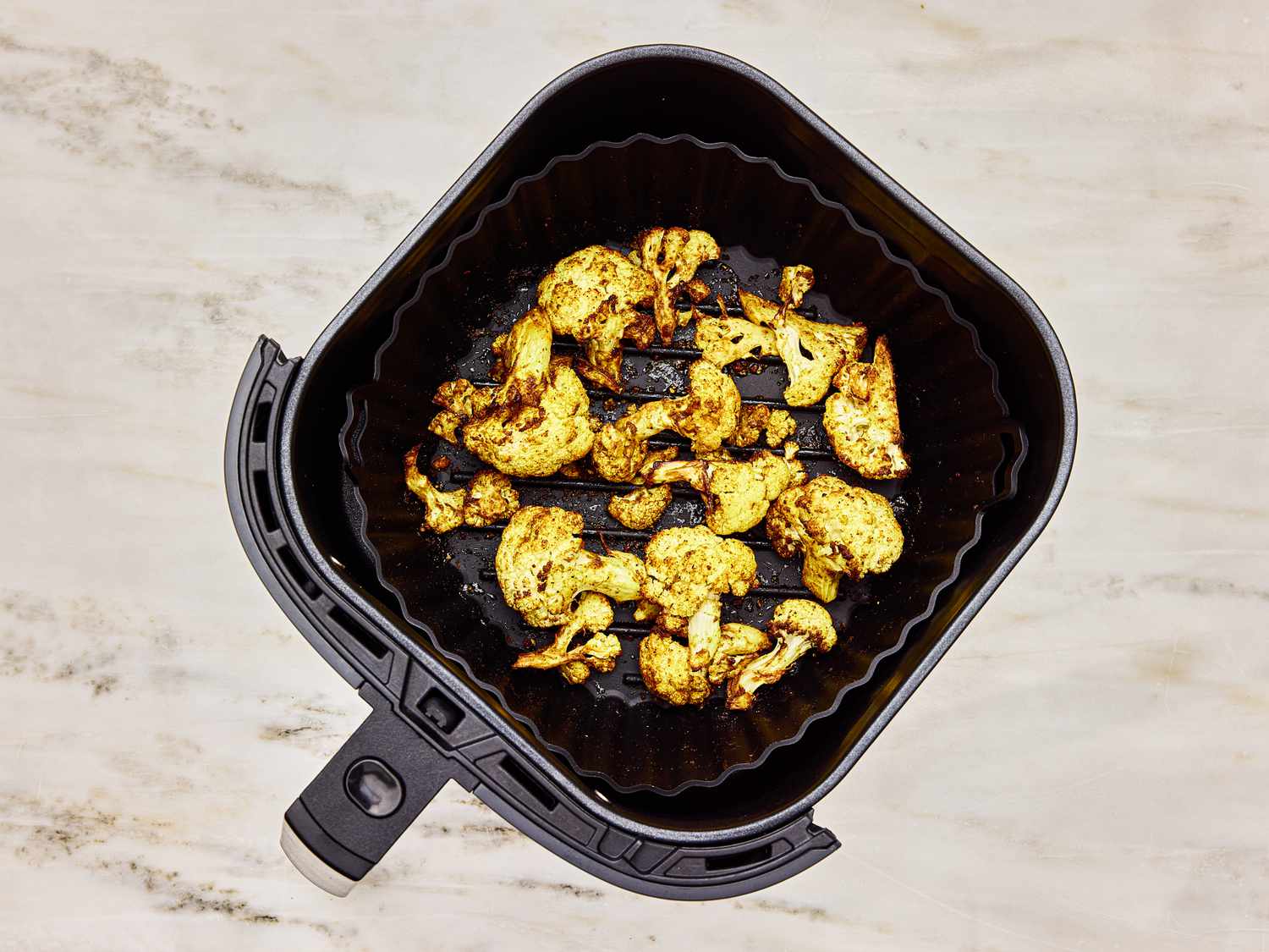 Overhead view of airfryer in basket after being cooked