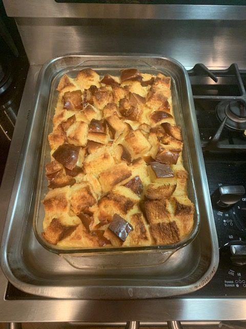 overhead view of tres leches bread pudding on a stovetop
