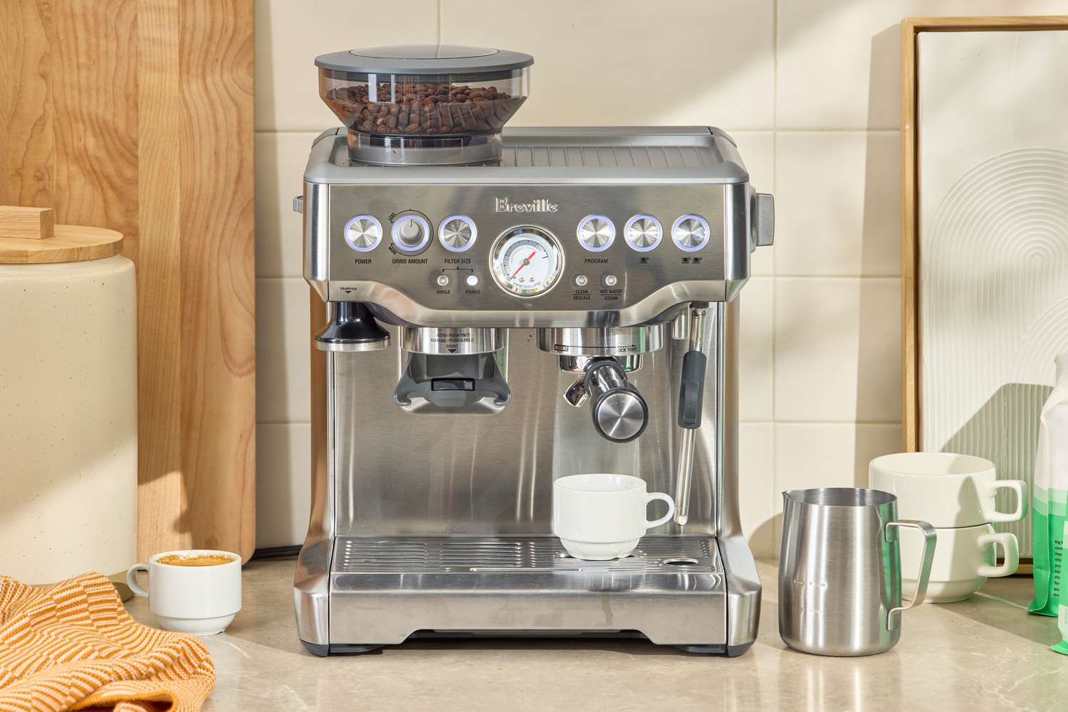 The Breville The Barista Express Espresso Machine on a kitchen countertop
