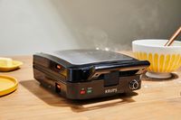 Krups 4-Slice Belgian Waffle Maker cooking a waffle 