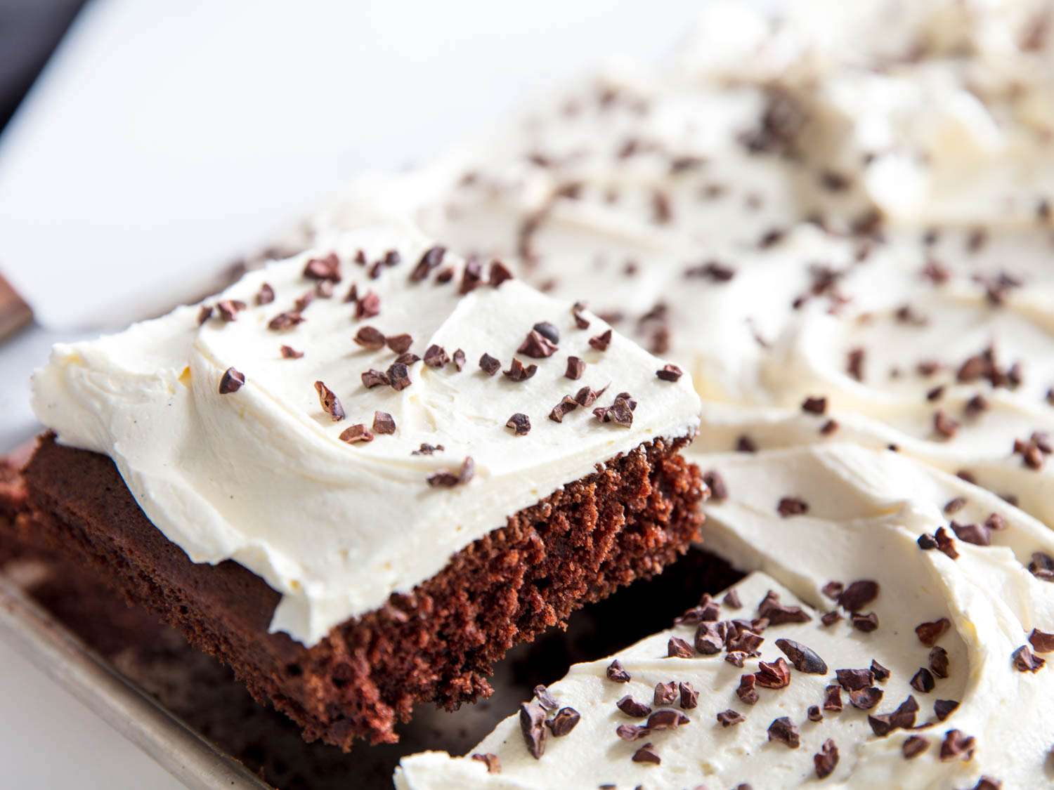 Close up view of a German buttercream frosted piece of cake. 