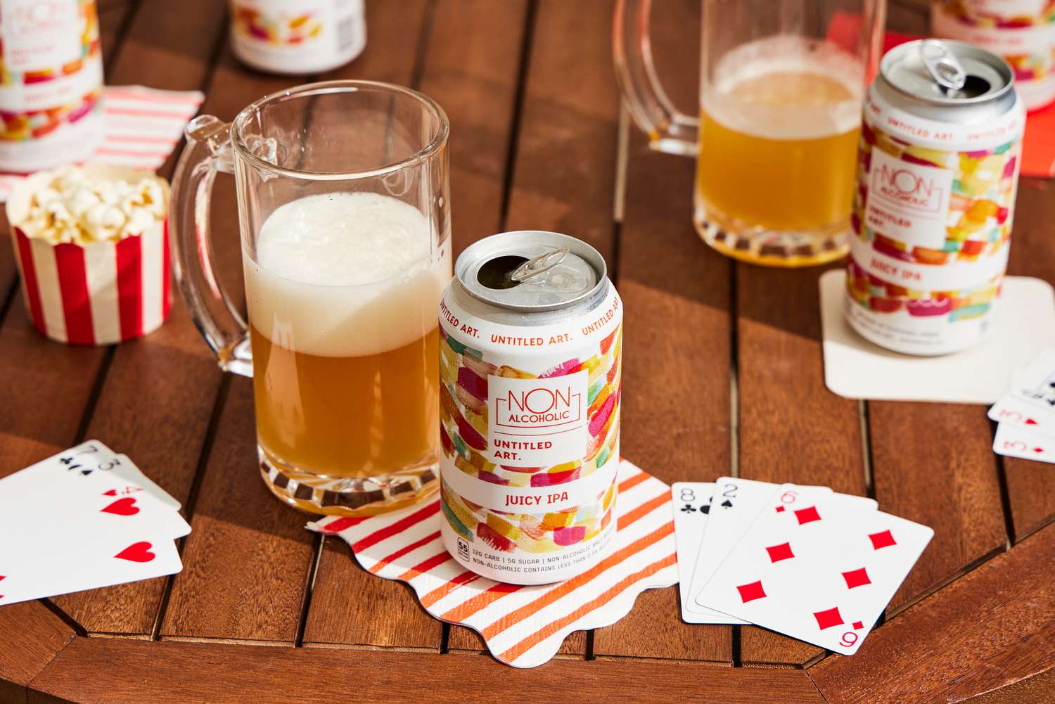 a can of untitled art ipa with a glass of beer behind it