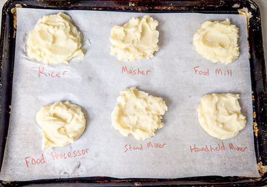 Six portions of mashed potatoes labeled by preparation method on parchment paper