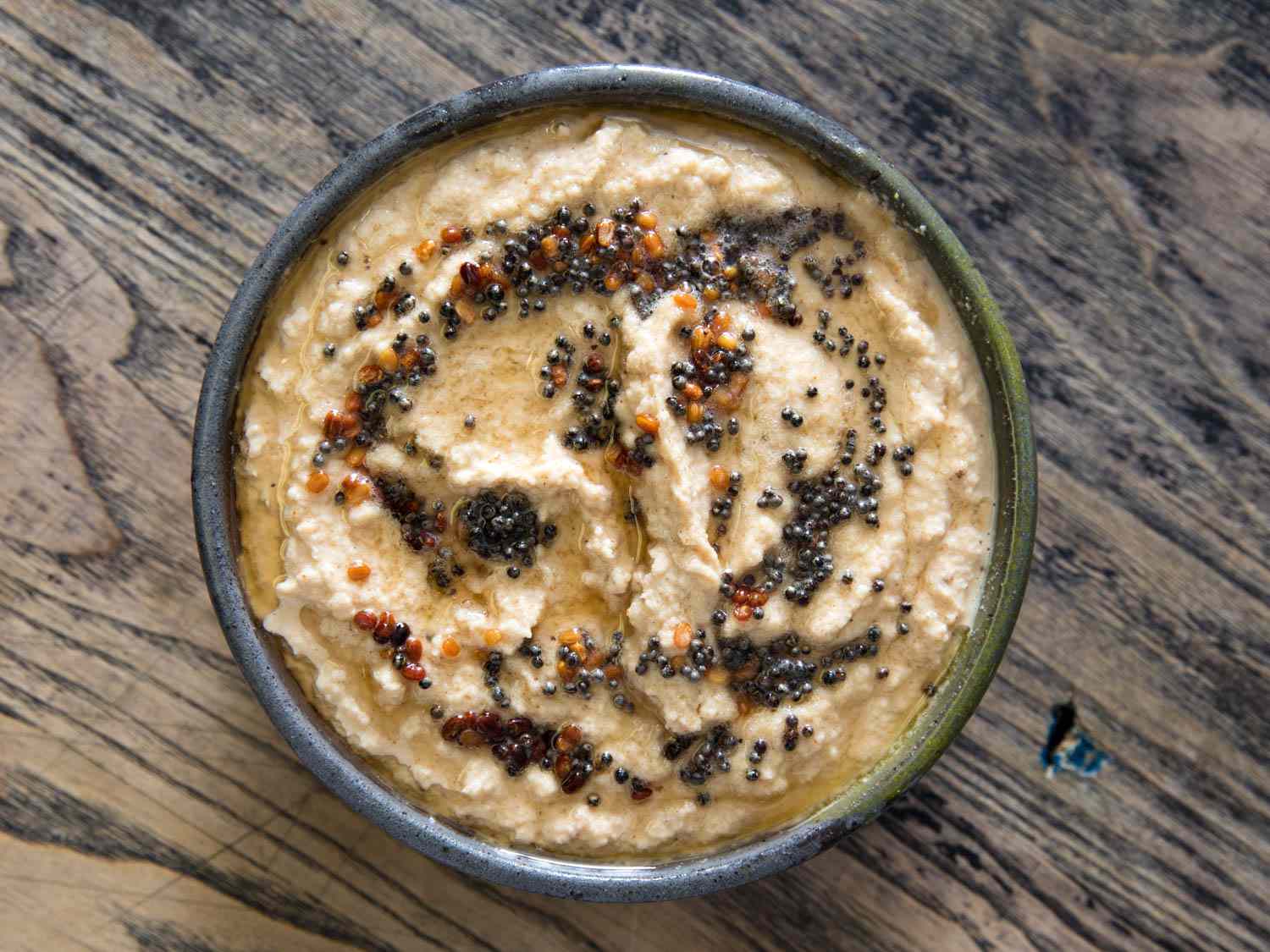Overhead view of the finished chutney, garnished with tadka.
