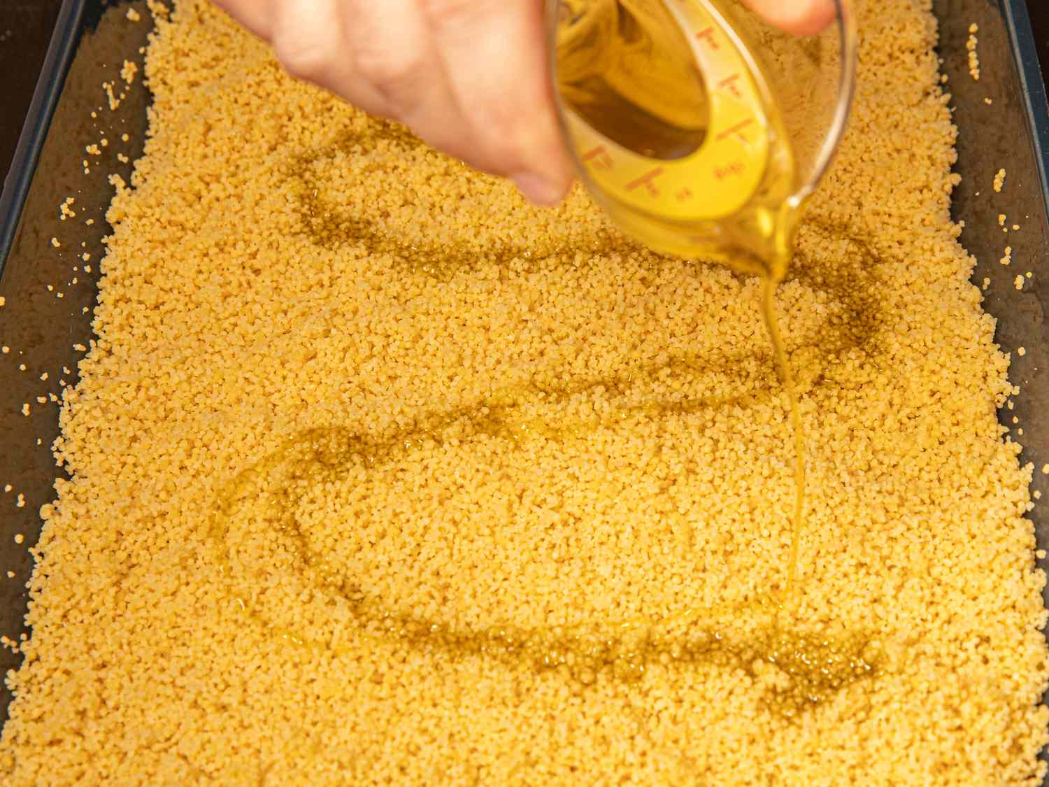 side view of pouring oil