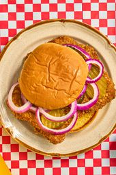 Overhead view of breaded pork tenderloin sandwich