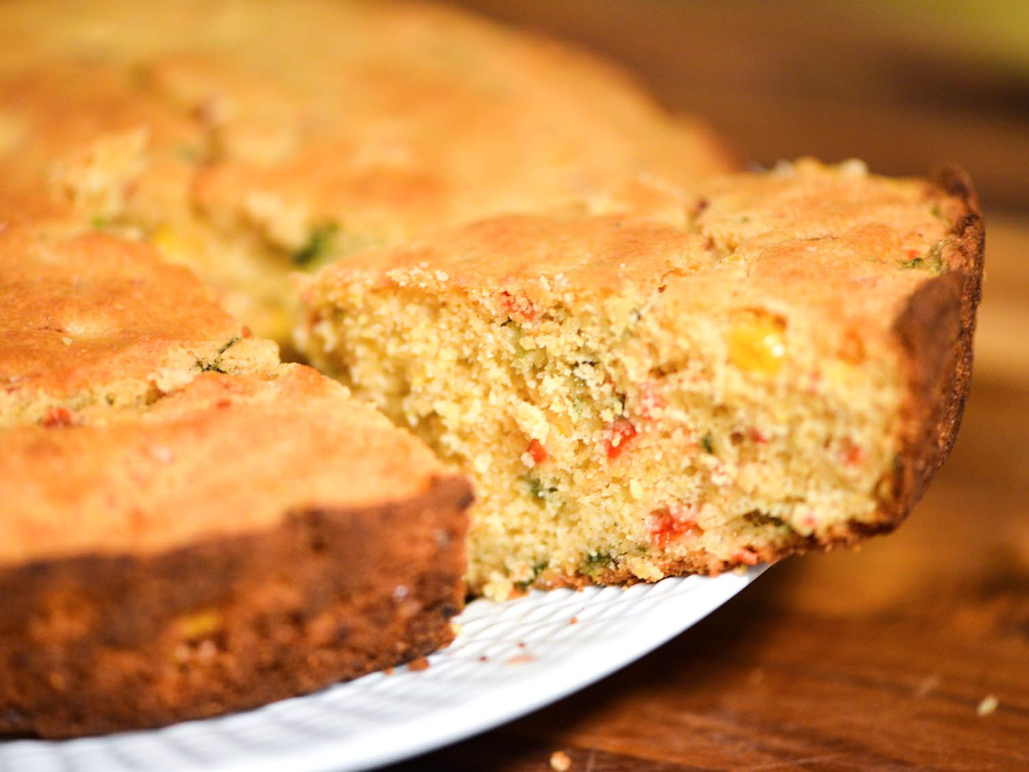 Cross-section wedge of roasted pepper cornbread.