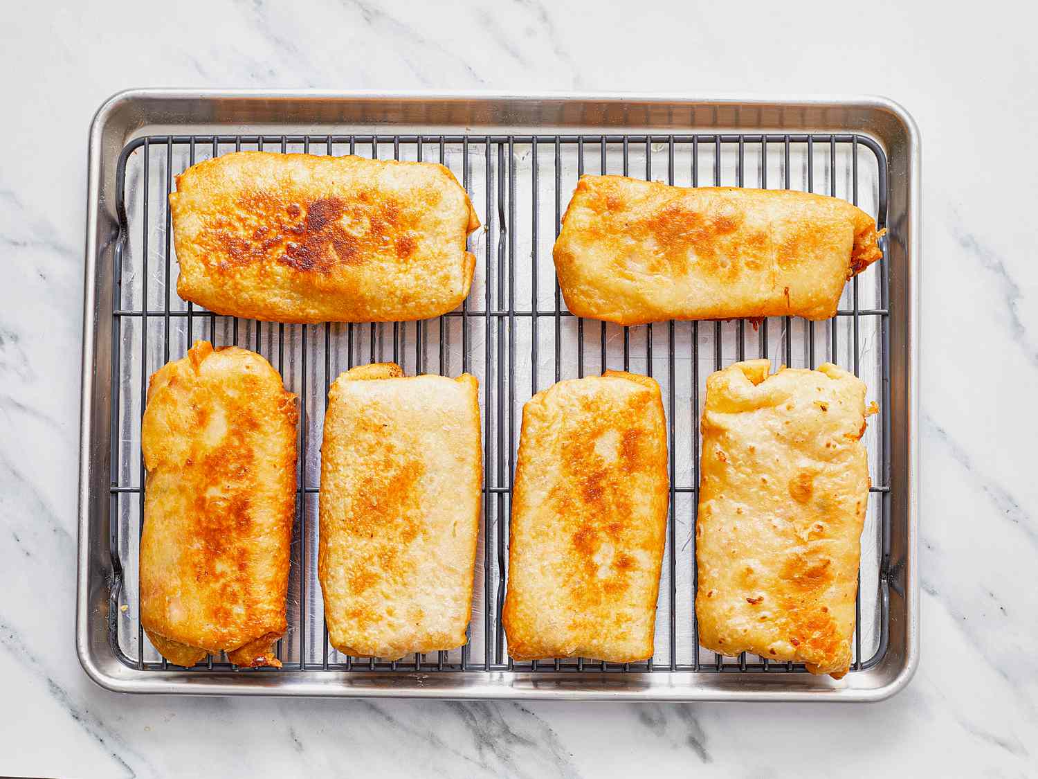 Overhead view of fried chimichangas 