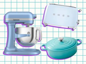 Kitchen appliances including a stand mixer, toaster, and dutch oven on a gridded background