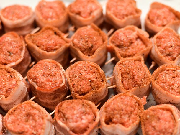 Meatballs wrapped and skewered with bacon and seasoned with barbecue rub.