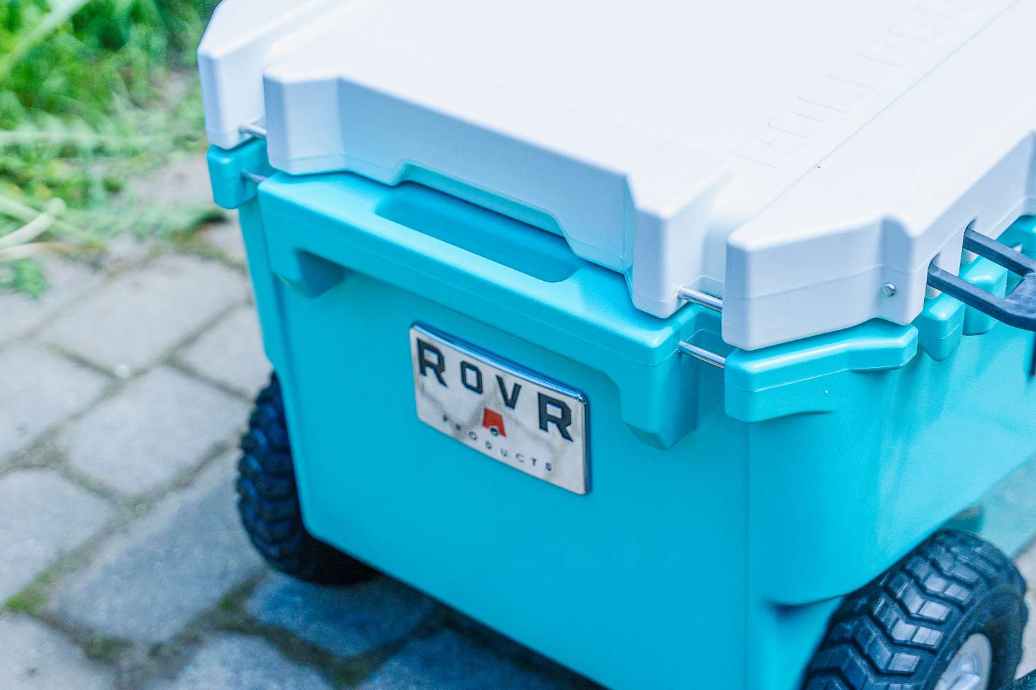 Brand logo on the back of the Rovr RollR 60 Wheeled Cooler