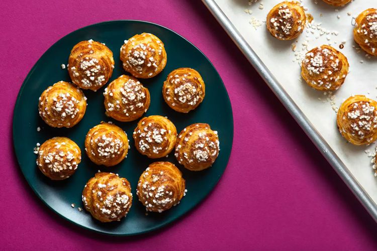 Plate of Chouquettes on a pink background