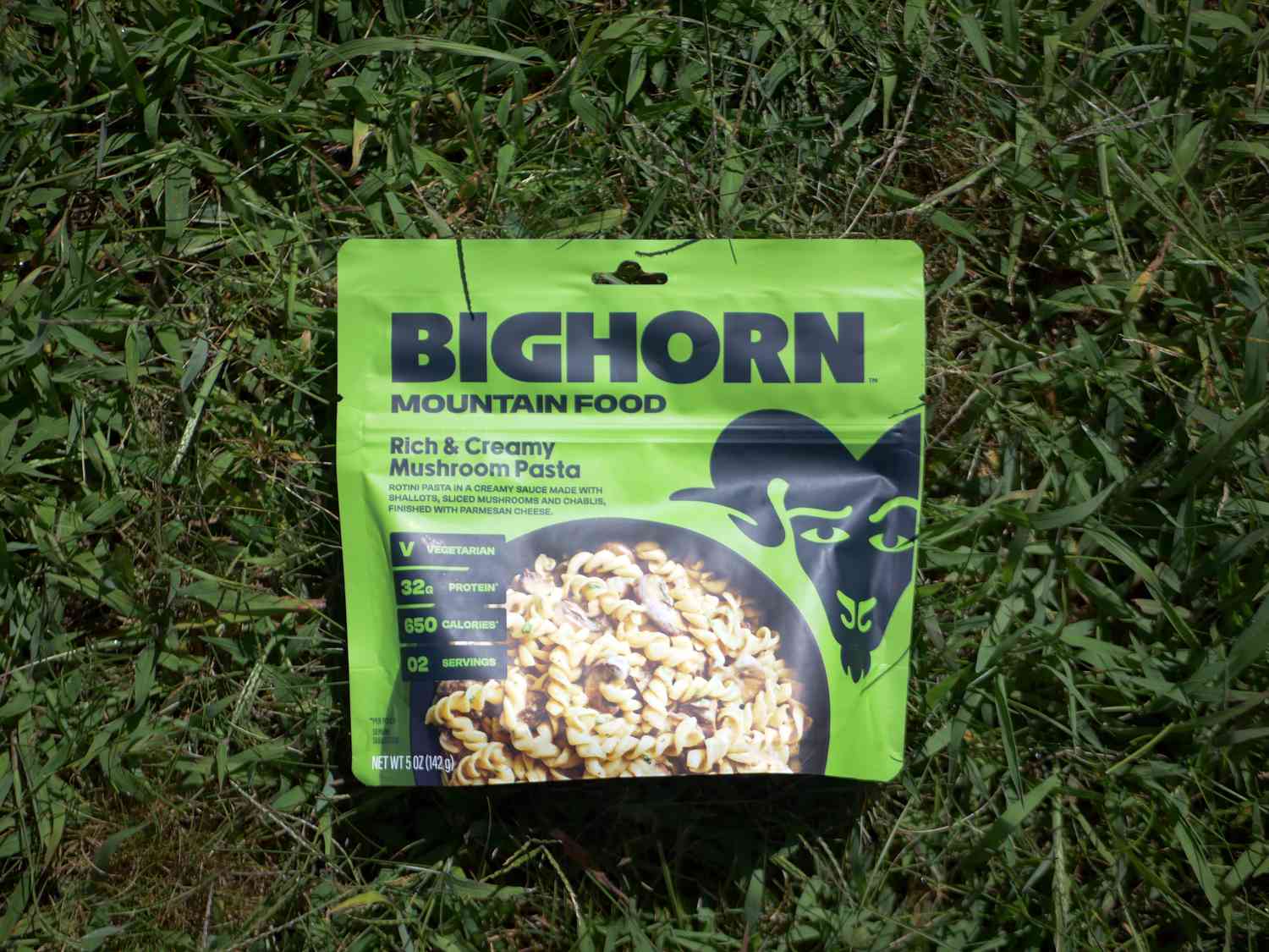 bighorn mountain food mushroom pasta packet on grassy lawn