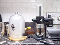 stundenglass cocktail smoker with smoke-filled cloche