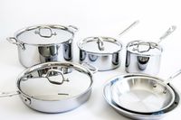 All-Clad D3 3-Ply Stainless Steel Cookware Set 10 Piece on a white surface