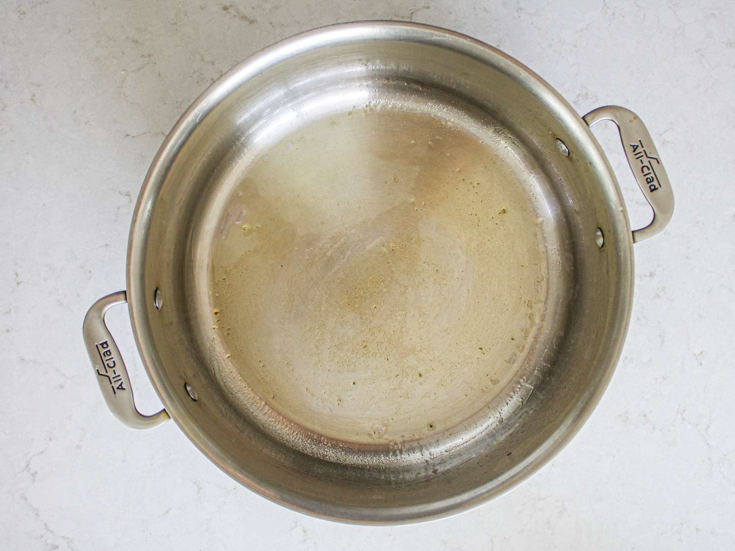 Pot lined with ghee