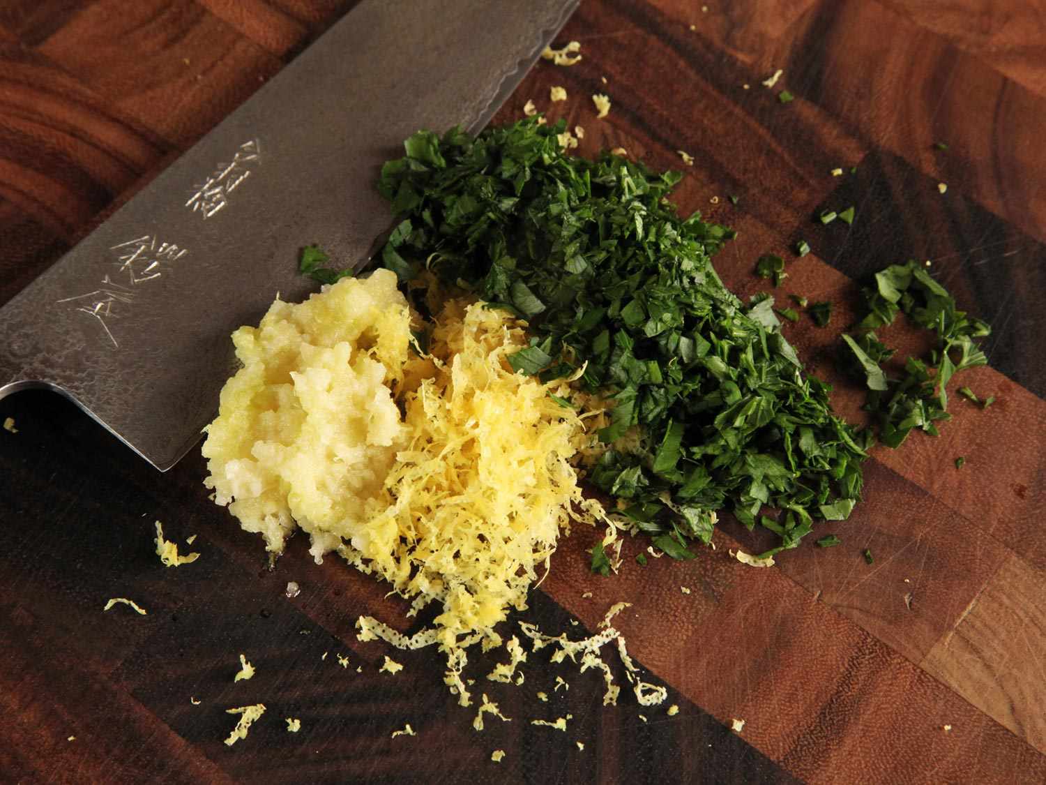 Minced garlic, lemon zest, and fresh parsley for gremolata.