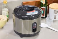 The Zojirushi NS-RPC10HM Rice Cooker on a kitchen countertop