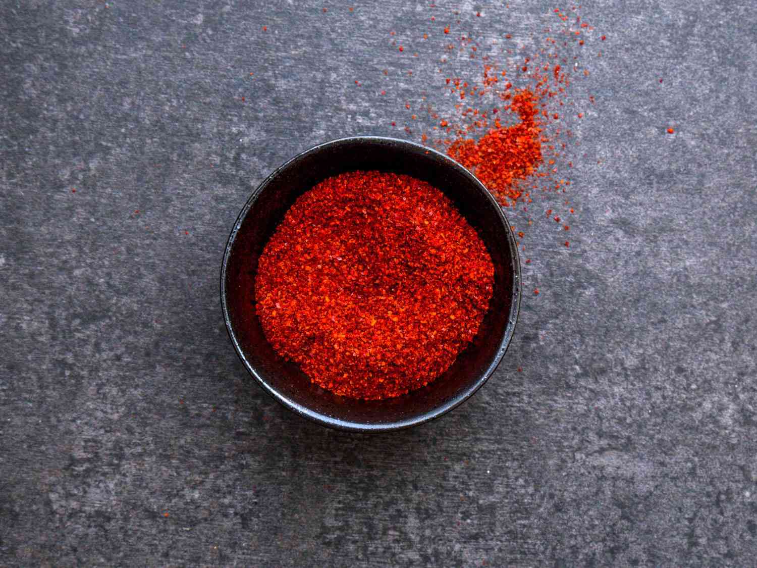 Closeup of gochugaru in a small ramekin.