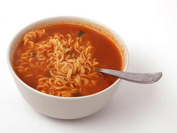 A bowl of Shin Ramyun with a spoon.