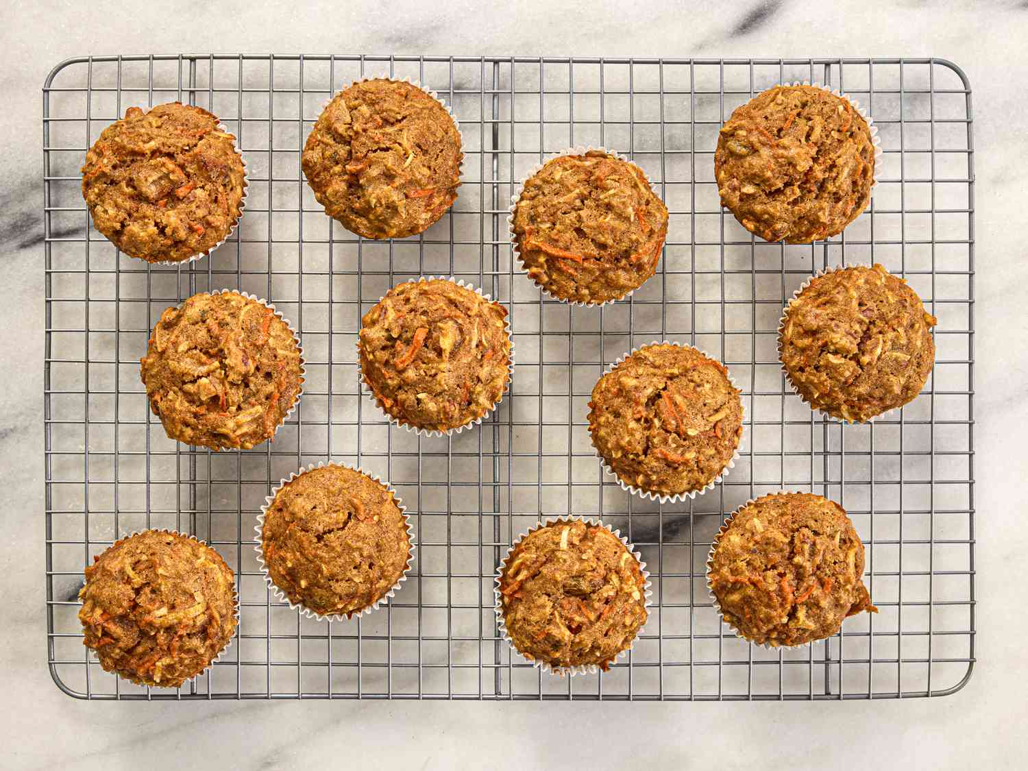 Overhead view of muffins cooling