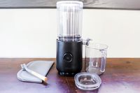 the nama nut milk maker on a wooden table