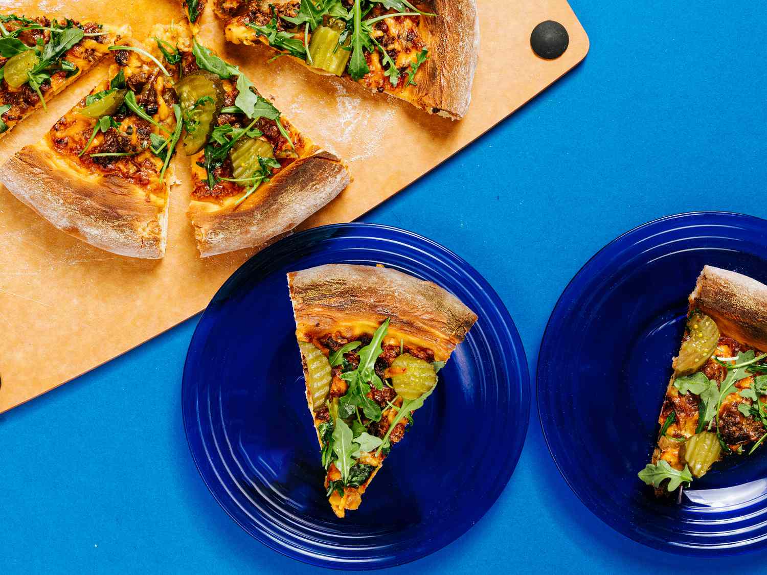 Overhead view of slices with cheeseburger Pizaa